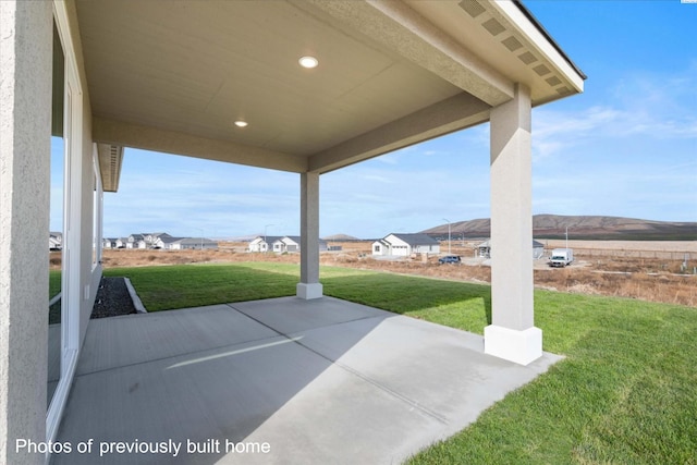 view of patio / terrace featuring a residential view
