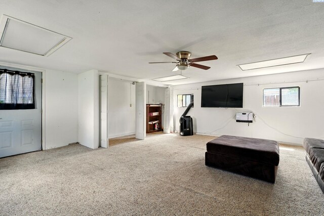 616 S Conway St, Kennewick, WA 99336 - living room with attic access, plenty of natural light, carpet, and ceiling fan