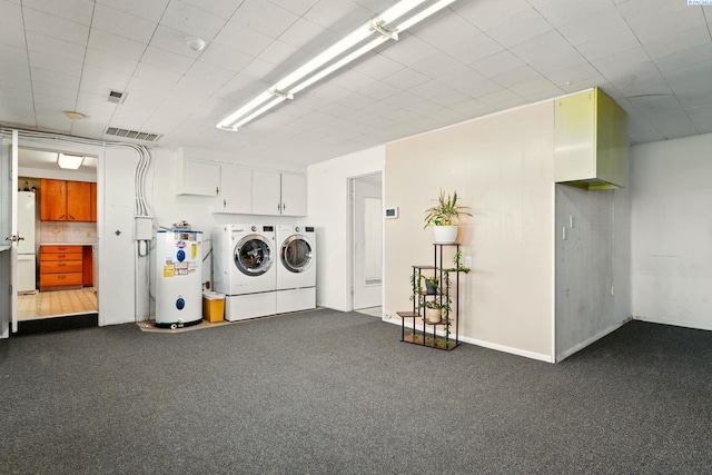 616 S Conway St, Kennewick, WA 99336 - laundry area with washer and clothes dryer, water heater, cabinet space, and dark colored carpet