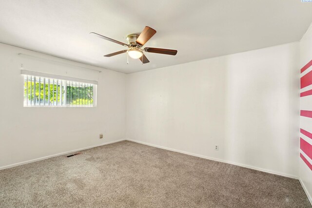 616 S Conway St, Kennewick, WA 99336 - carpeted empty room featuring a ceiling fan and baseboards