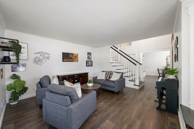 10219 W Argent Rd, Pasco, WA 99301 - living room with dark wood-style flooring, stairs, and ornamental molding