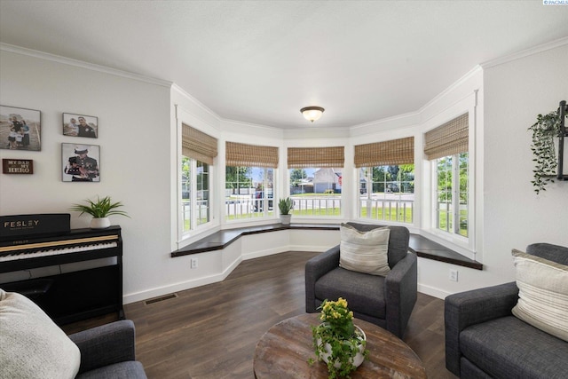 10219 W Argent Rd, Pasco, WA 99301 - living room featuring ornamental molding and dark wood-style floors