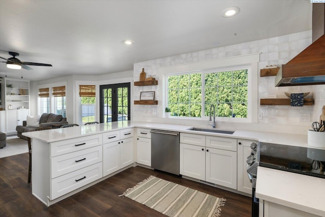 10219 W Argent Rd, Pasco, WA 99301 - kitchen with open shelves, dishwasher, premium range hood, a peninsula, and light countertops