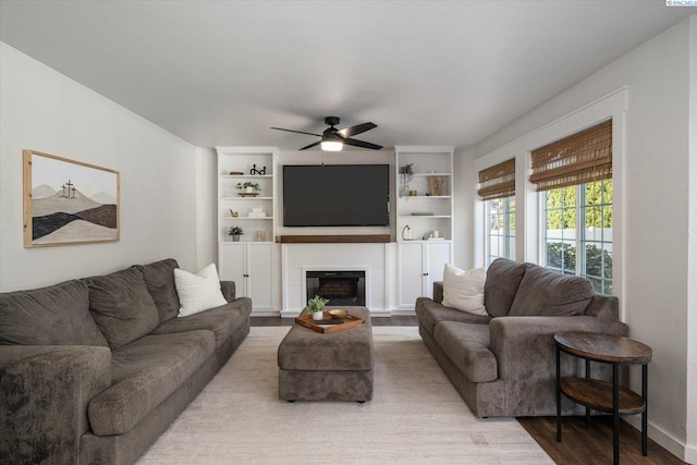 10219 W Argent Rd, Pasco, WA 99301 - living area with ceiling fan, wood finished floors, and a fireplace