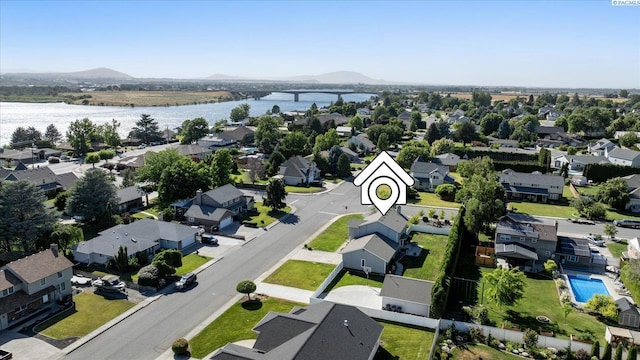 10219 W Argent Rd, Pasco, WA 99301 - aerial view of residential area with a water and mountain view