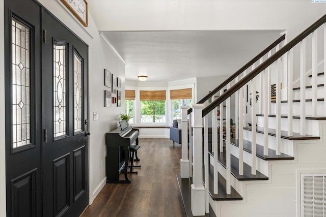 10219 W Argent Rd, Pasco, WA 99301 - entrance foyer featuring dark wood-style flooring and stairway