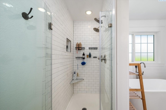 10219 W Argent Rd, Pasco, WA 99301 - bathroom featuring a stall shower, a soaking tub, and recessed lighting