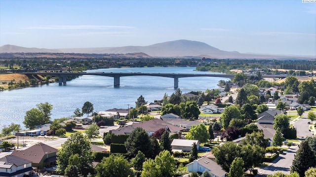 10219 W Argent Rd, Pasco, WA 99301 - aerial view of residential area with a notable bridge and a water and mountain view