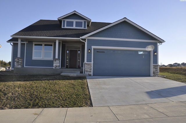 craftsman-style house featuring a garage