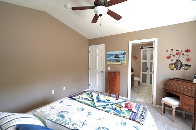 1135 SW Lost Trail Dr, Pullman, WA 99163 - bedroom with vaulted ceiling, light marble finish floors, ensuite bathroom, and ceiling fan