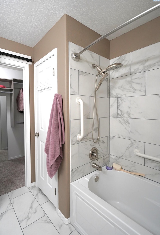 1135 SW Lost Trail Dr, Pullman, WA 99163 - bathroom featuring shower / bath combination, a textured ceiling, and marble look tile flooring