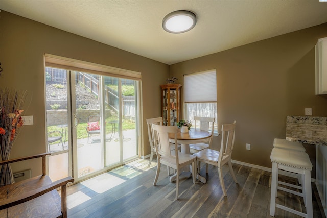 1135 SW Lost Trail Dr, Pullman, WA 99163 - dining area featuring wood finished floors and baseboards