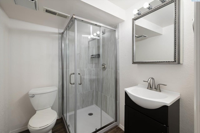 2714 W John Day Ave, Kennewick, WA 99336 - bathroom with toilet, vanity, and a stall shower