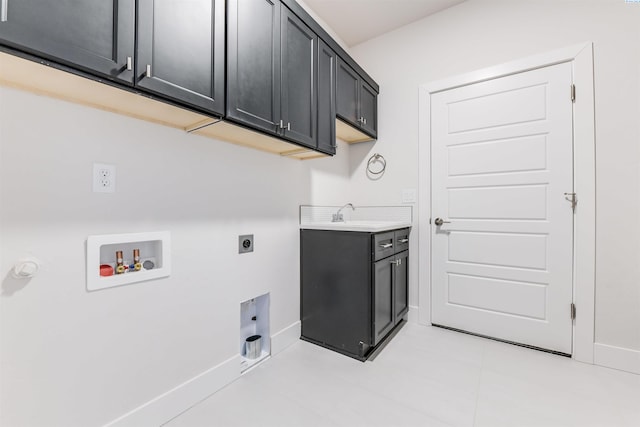 clothes washing area with gas dryer hookup, sink, cabinets, washer hookup, and hookup for an electric dryer