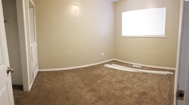 1529 Mcpherson Ave, Richland, WA 99352 - unfurnished bedroom featuring carpet and baseboards