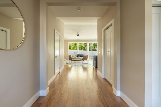 corridor featuring light wood-type flooring