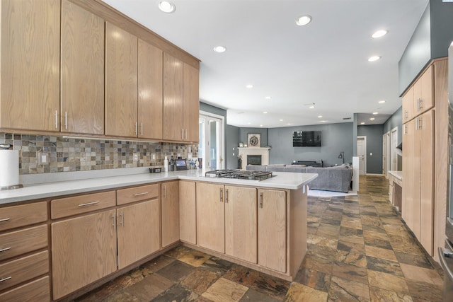 3501 W 42nd Ave, Kennewick, WA 99337 - kitchen with a peninsula, recessed lighting, open floor plan, dark stone finish flooring, and light countertops