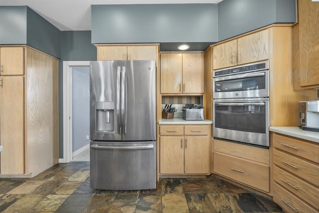 3501 W 42nd Ave, Kennewick, WA 99337 - kitchen with appliances with stainless steel finishes, dark stone finish floors, light countertops, and baseboards