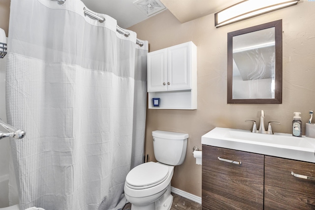 3501 W 42nd Ave, Kennewick, WA 99337 - full bathroom with toilet, vanity, a shower with curtain, and baseboards