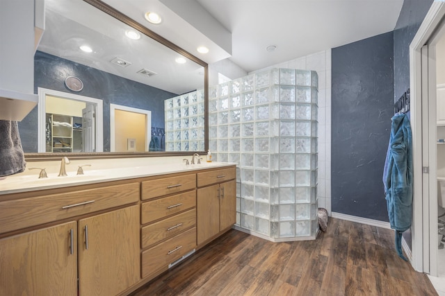 3501 W 42nd Ave, Kennewick, WA 99337 - full bathroom featuring wood finished floors, walk in shower, double vanity, and recessed lighting