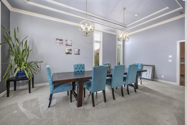 3501 W 42nd Ave, Kennewick, WA 99337 - carpeted dining room with a raised ceiling, a chandelier, crown molding, and baseboards