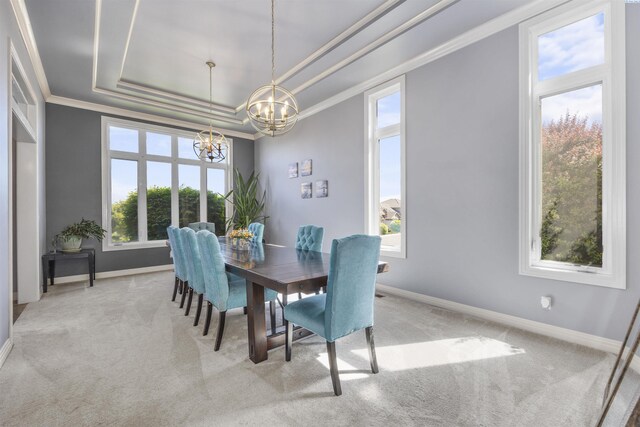 3501 W 42nd Ave, Kennewick, WA 99337 - dining space featuring a chandelier, a raised ceiling, light colored carpet, ornamental molding, and baseboards