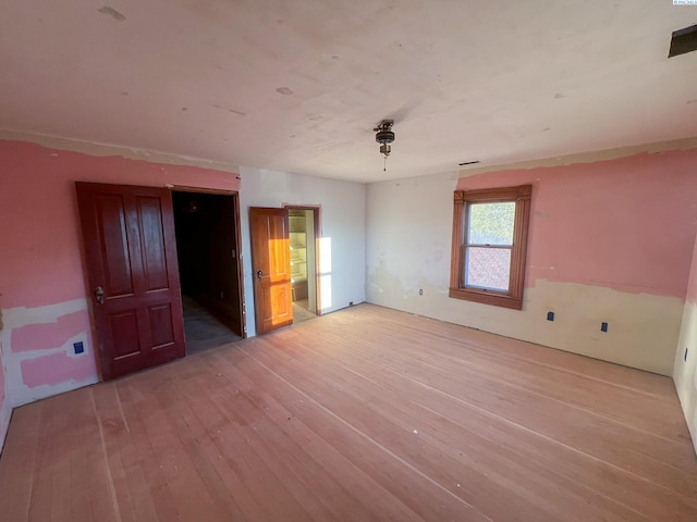 empty room with light wood-type flooring