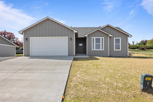 ranch-style home featuring a front lawn, a shingled roof, driveway, board and batten siding, and an attached garage
