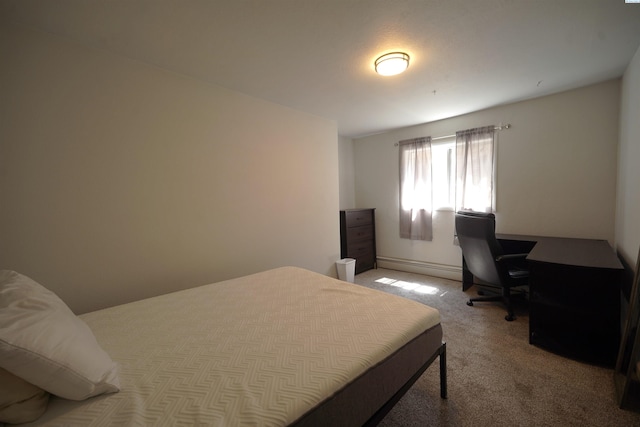 bedroom featuring light colored carpet