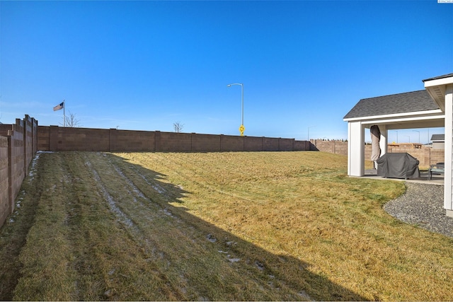 view of yard featuring a fenced backyard