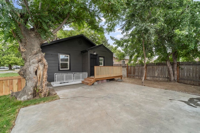 732 W Henry St, Pasco, WA 99301 - back of property with a patio, a fenced backyard, and a deck
