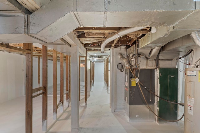 732 W Henry St, Pasco, WA 99301 - unfinished basement featuring electric water heater and heating unit