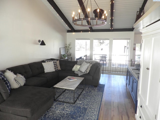 living room with an inviting chandelier, wood-type flooring, high vaulted ceiling, and beamed ceiling