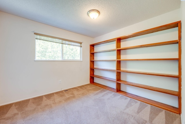 340-342 NW N St, Pullman, WA 99163 - carpeted empty room featuring a textured ceiling and visible vents