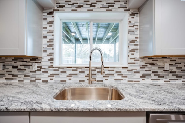 340-342 NW N St, Pullman, WA 99163 - room details with light stone countertops, backsplash, and a sink