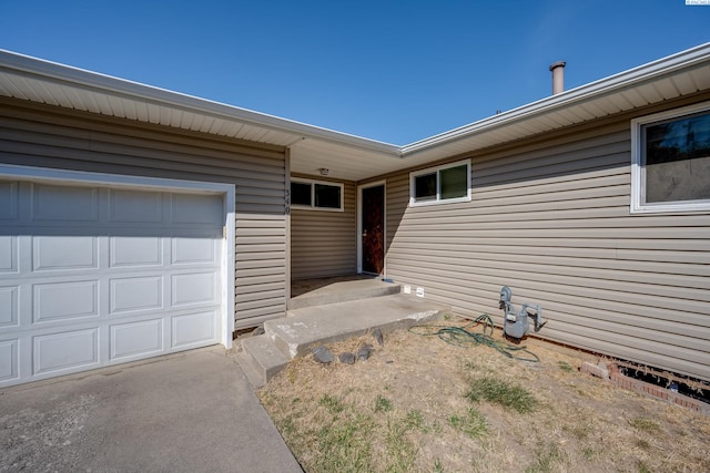 340-342 NW N St, Pullman, WA 99163 - doorway to property with an attached garage