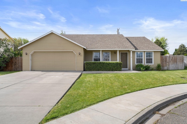 1707 W 25th Pl, Kennewick, WA 99337 - ranch-style home featuring a garage, driveway, and a shingled roof