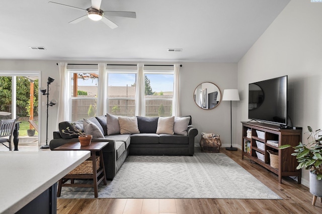 1707 W 25th Pl, Kennewick, WA 99337 - living area with light wood finished floors, ceiling fan, and baseboards