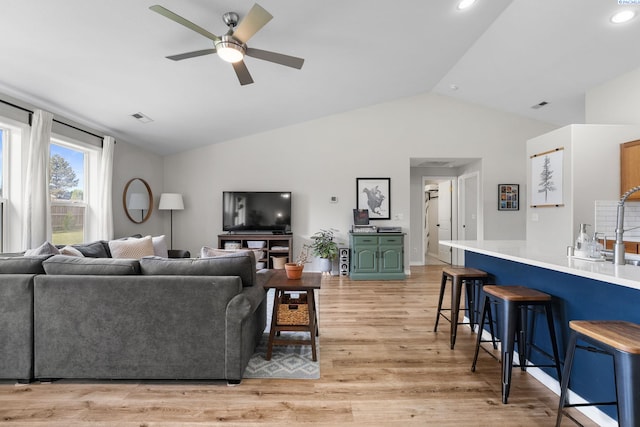 1707 W 25th Pl, Kennewick, WA 99337 - living room featuring ceiling fan, lofted ceiling, light wood-type flooring, and recessed lighting
