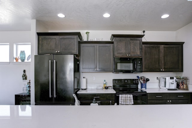 2140 W 23rd Ave, Kennewick, WA 99337 - kitchen featuring black appliances, light countertops, recessed lighting, and dark brown cabinetry