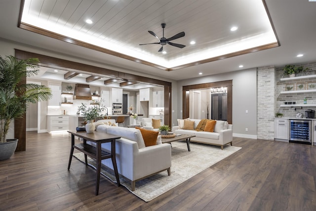 6169 W 28th Ave, Kennewick, WA 99338 - living area with beverage cooler, a raised ceiling, ceiling fan, recessed lighting, and dark wood-style flooring