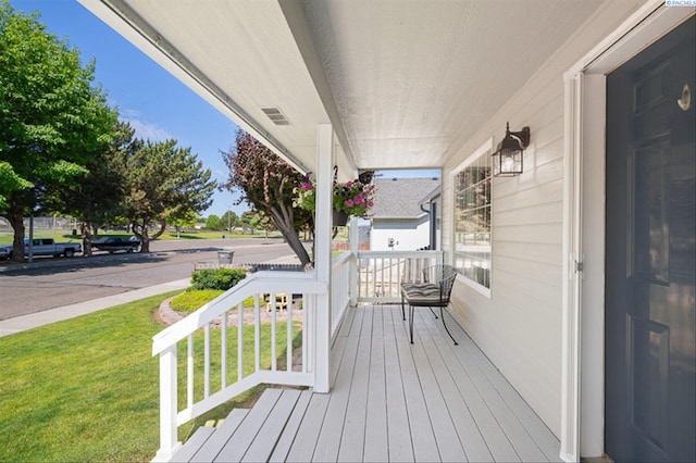 2302 W 31st Ave, Kennewick, WA 99337 - wooden porch featuring a yard