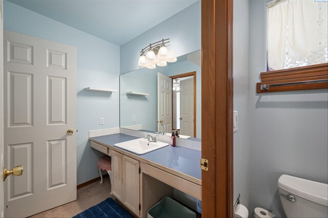 2302 W 31st Ave, Kennewick, WA 99337 - half bath with toilet, vanity, and baseboards
