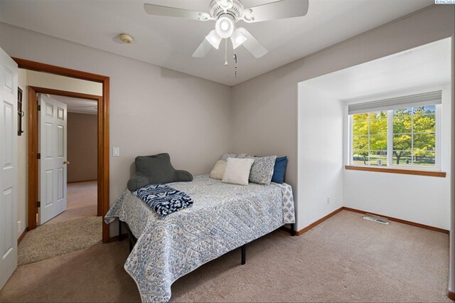 2302 W 31st Ave, Kennewick, WA 99337 - bedroom with carpet floors, baseboards, and ceiling fan