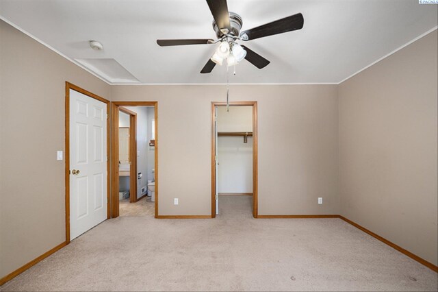 2302 W 31st Ave, Kennewick, WA 99337 - unfurnished bedroom with baseboards, carpet floors, a spacious closet, crown molding, and ensuite bath