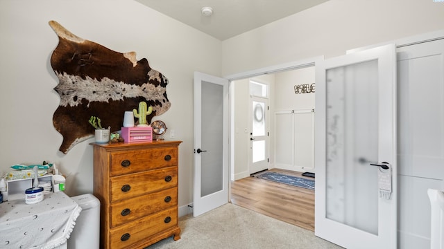 6012 W 31st Ave, Kennewick, WA 99336 - bedroom with french doors, wood finished floors, and baseboards