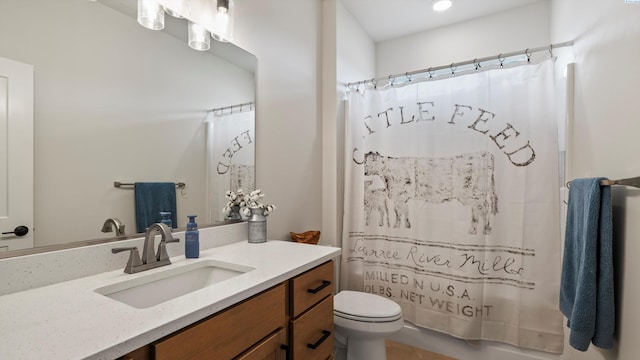 6012 W 31st Ave, Kennewick, WA 99336 - full bathroom with toilet, vanity, and shower / tub combo with curtain