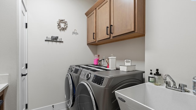 6012 W 31st Ave, Kennewick, WA 99336 - washroom with separate washer and dryer and cabinet space