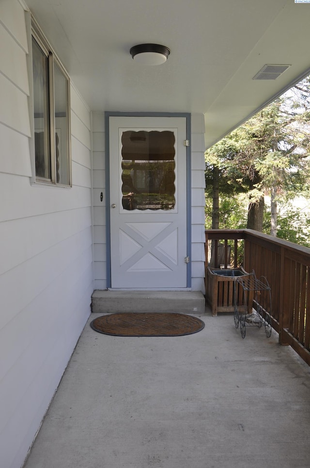 entrance to property featuring visible vents