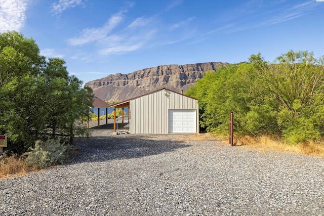 garage featuring a mountain view